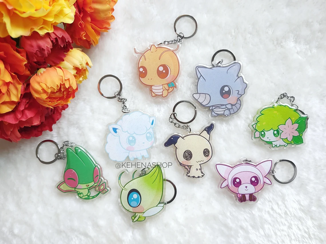 Llavero/Keychain Pokemon (Mimikyu, Flygon, Dragonite, Celebi, Shaymin, Alolan Vulpix, Rhydon, Stufful)