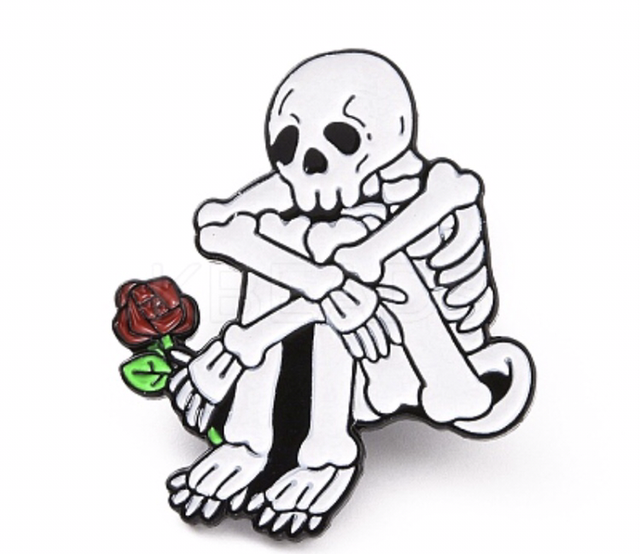 Pinssi istuva luuranko 