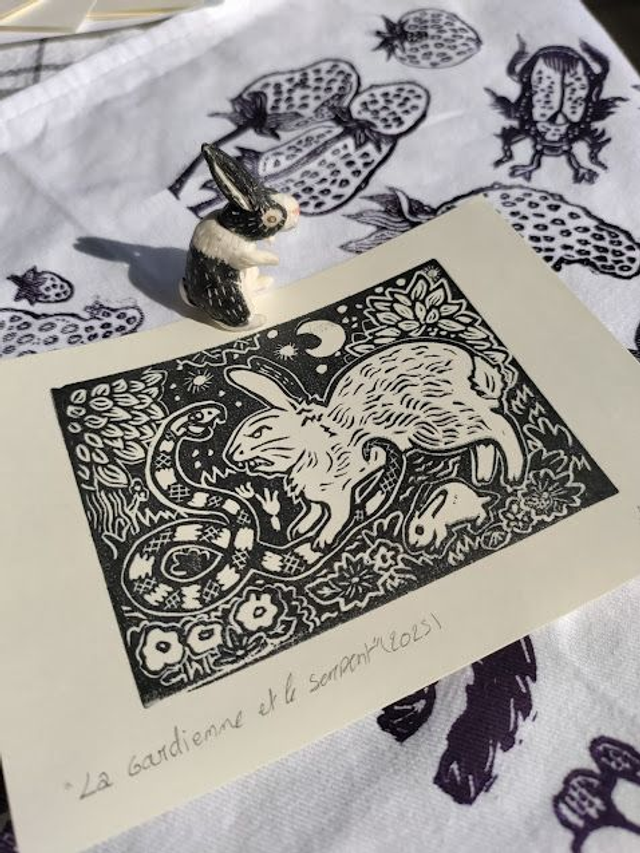 Linogravure/tampon " la gardienne et le serpent" lapins sauvage format 10X14.5 cm