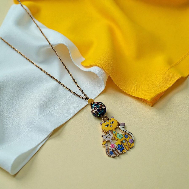 Collier acier inoxydable et cristal jaune et blanc chats