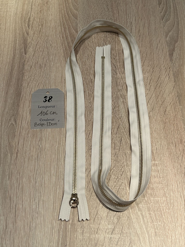 Fermetures éclair métallique beige doré 106cm