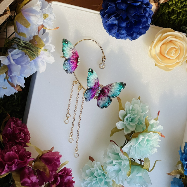 Papillon turquoise violet