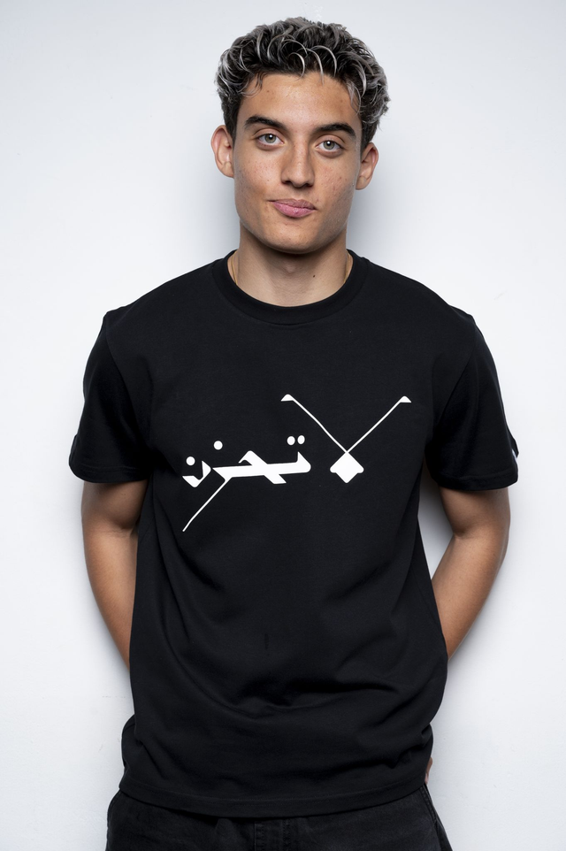 T shirt with Arabic proverb
