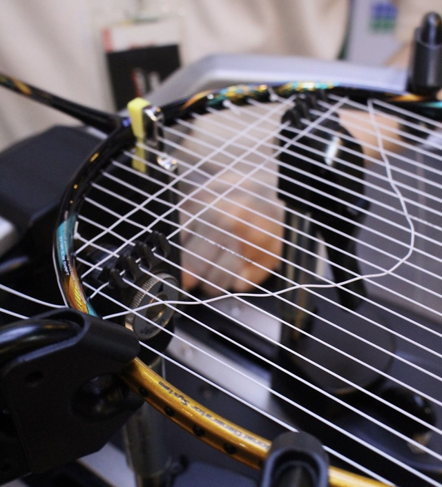 Pose cordage raquette badminton