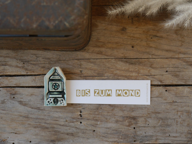 Kleine Rakete mit Magnet und Banderole