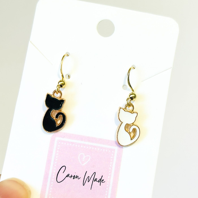 Black and white cat mismatched earrings