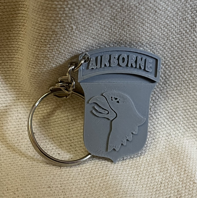 Petit porte clé air born gris