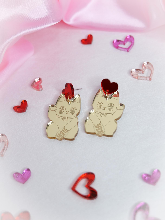 Onnenkissa-korvakorut