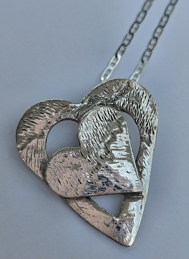 Double heart fine silver pendant 