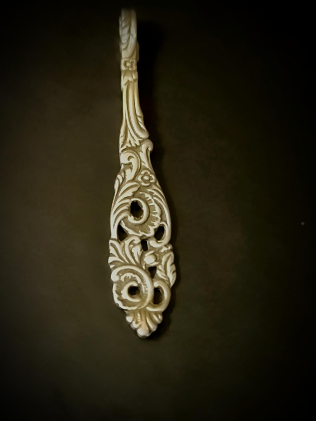 Porte-clé en métal argenté