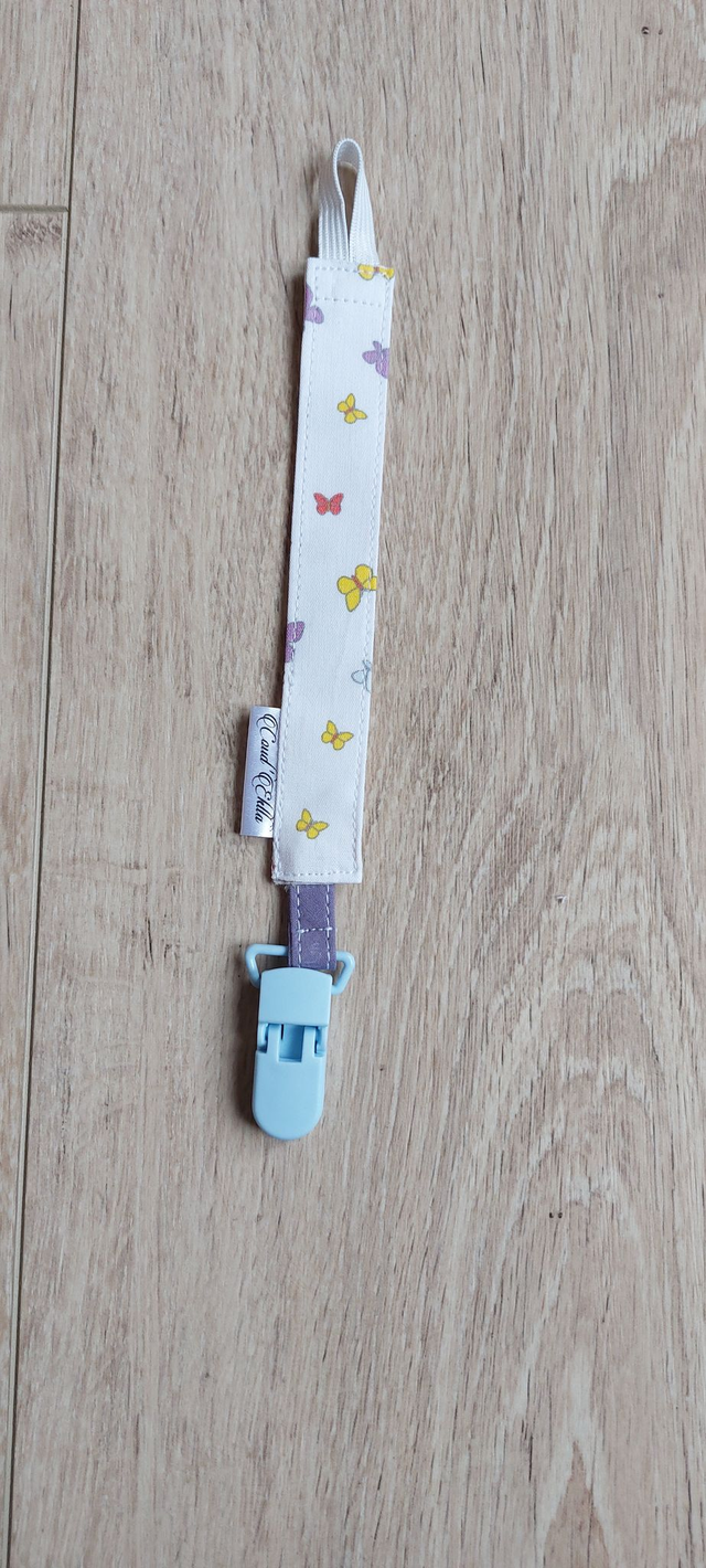 Attache sucette papillon