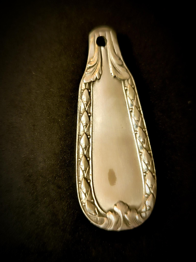 Porte-clé en métal argenté