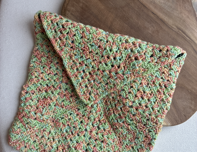 Pochette verte et orange 