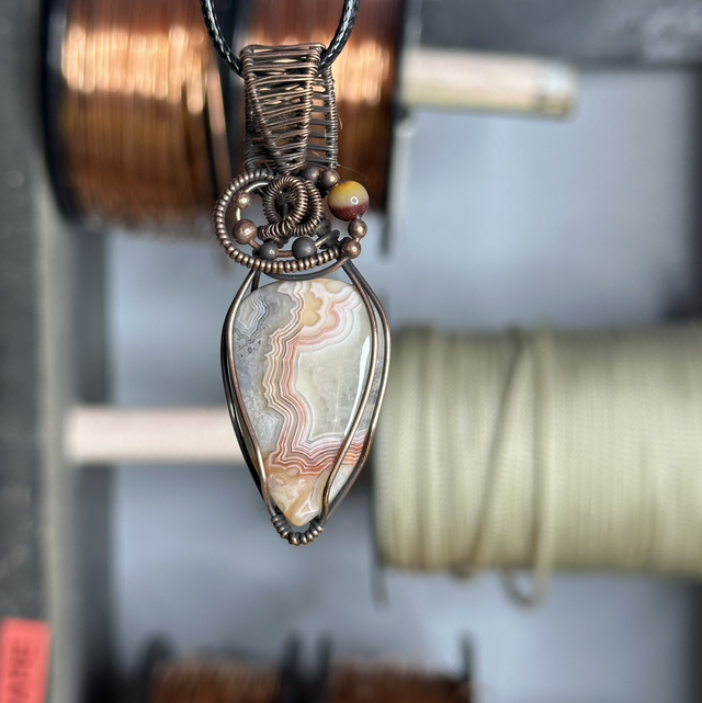 Crazy lace Agate pure copper wrapped pendant 