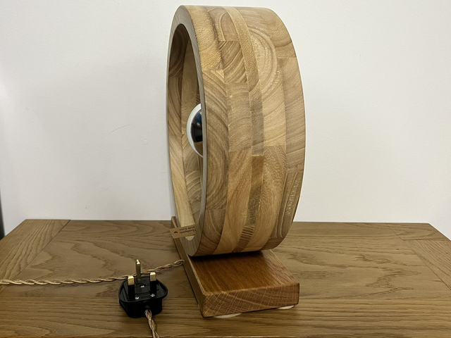 Modern round living room lamp with Edison bulb.