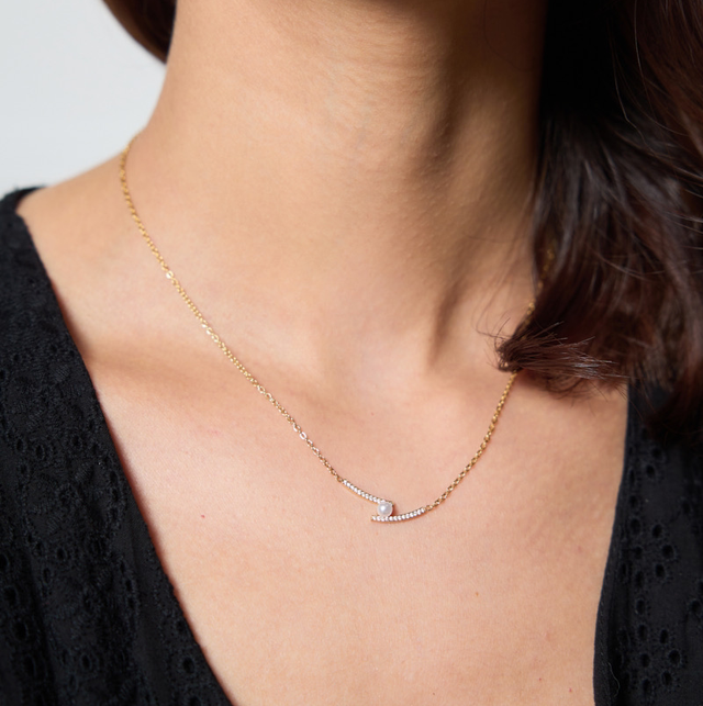 Collier perle strass croisé 