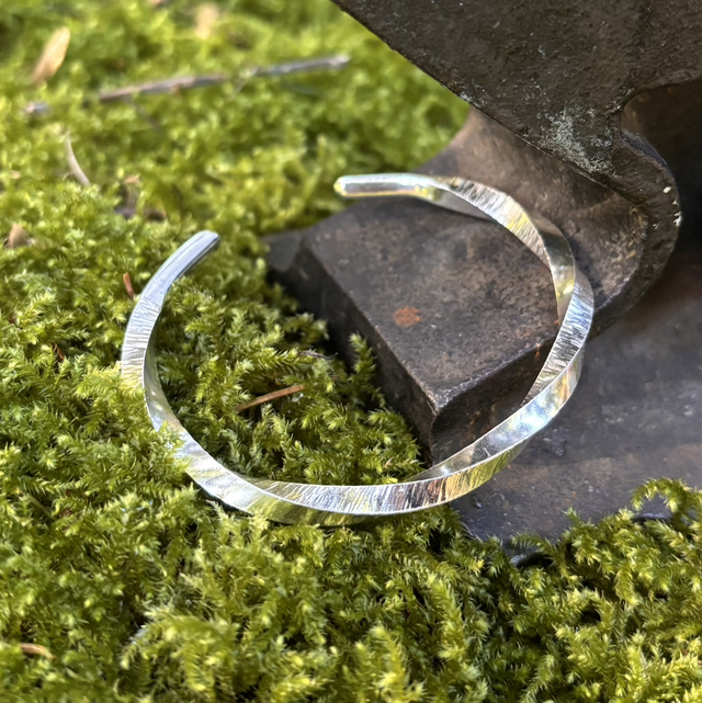 Manchette torsade homme 