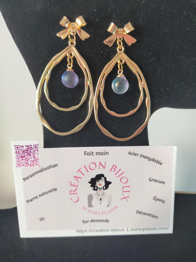 Boucle d'oreille ovale et perle