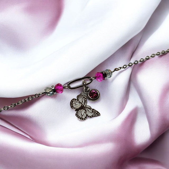 Bracelet acier inoxydable et strass rose fuchsia et argenté