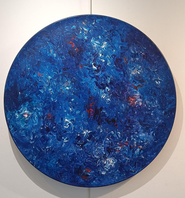 Tondo bleu et rouge par Hamid Fakhoury 