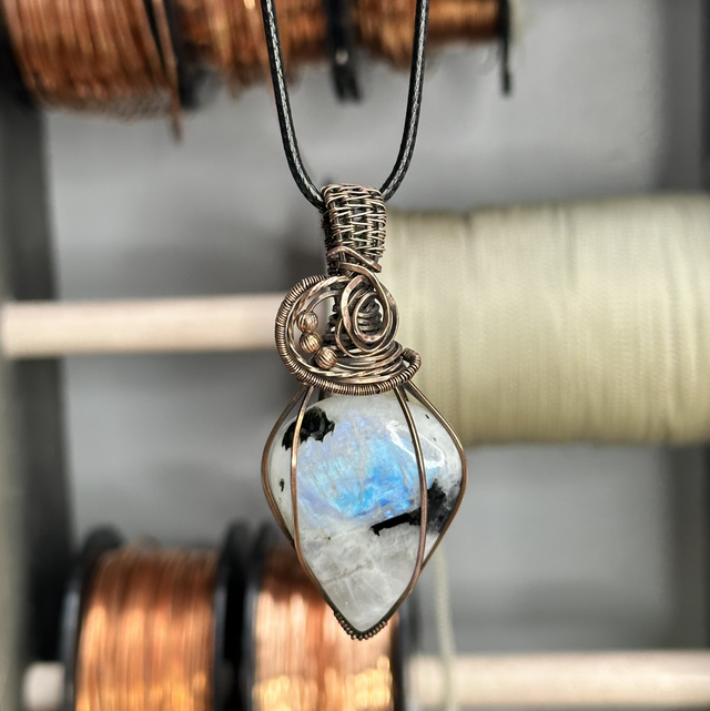 Rainbow moonstone wrapped in pure copper pendant 