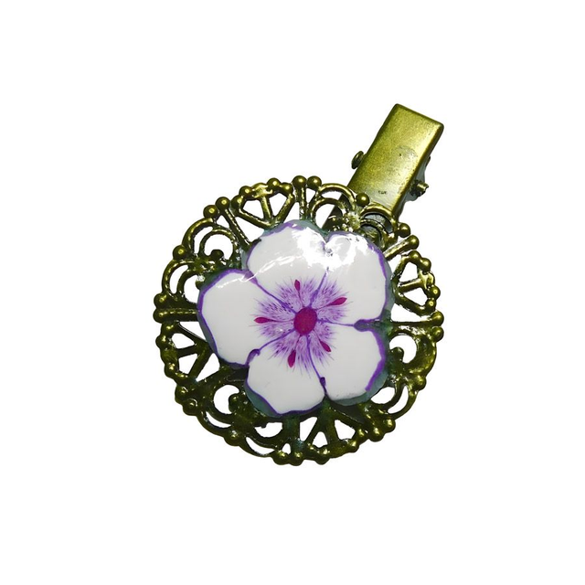Pince rétro estampe ronde fleur lilas