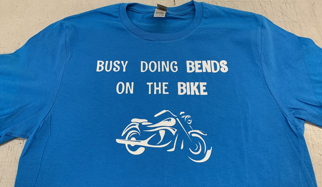 Busy doing bends on the bike  T-Shirt  