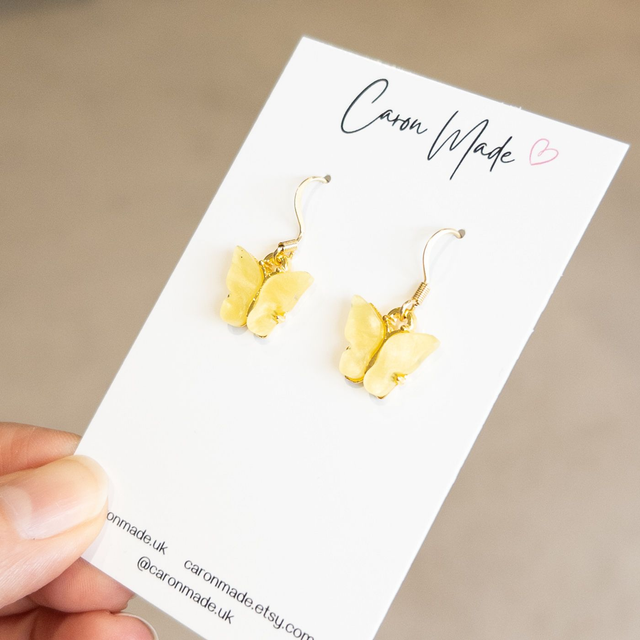 Butterfly charm earrings - yellow and gold