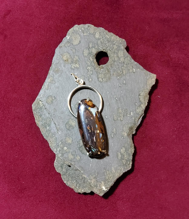 Large oval Australian boulder opal pendant set in Argentium silver