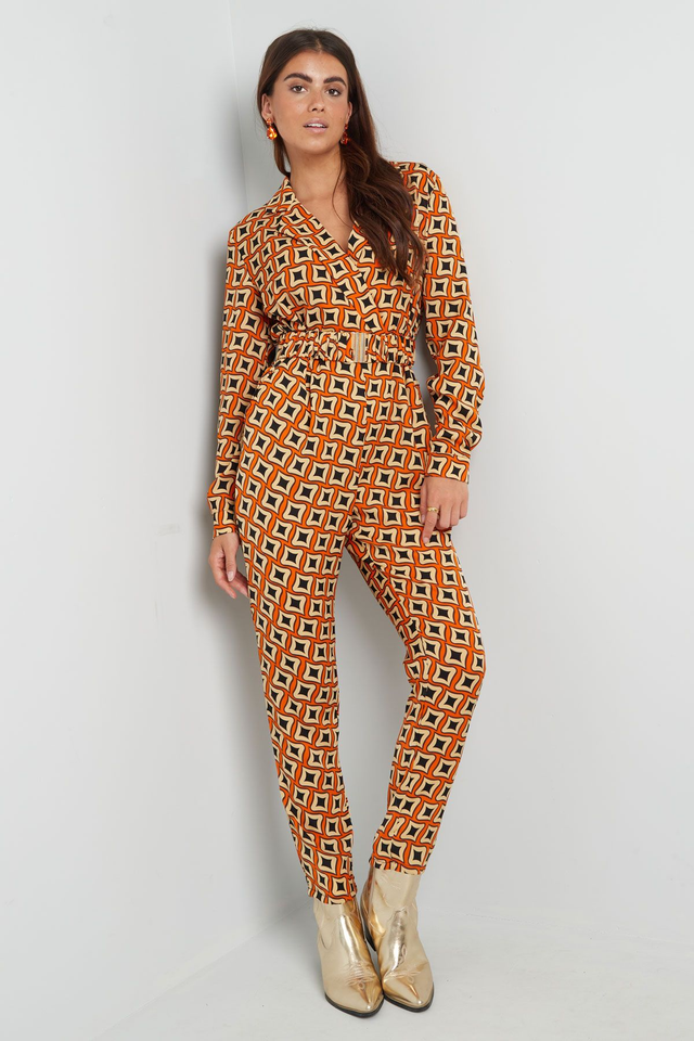 Oranje Geometrische Festival Jumpsuit voor Dames – Trendy & Comfortabel – M en L (Polyester)