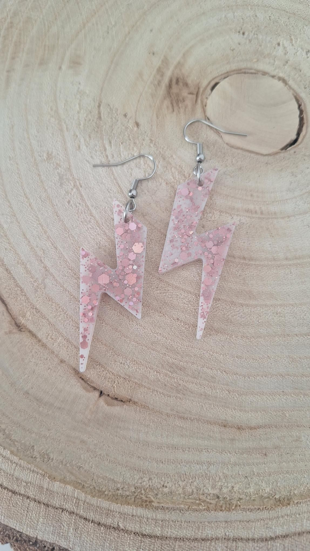 Boucles d&#039;oreilles éclairs blanches/paillettes roses