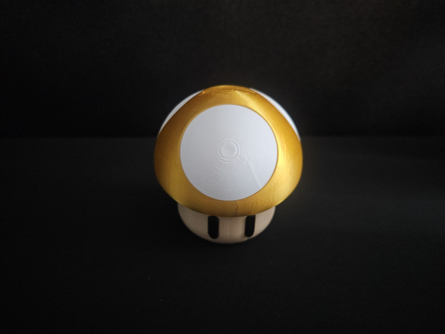 Tirelire champignon dorée