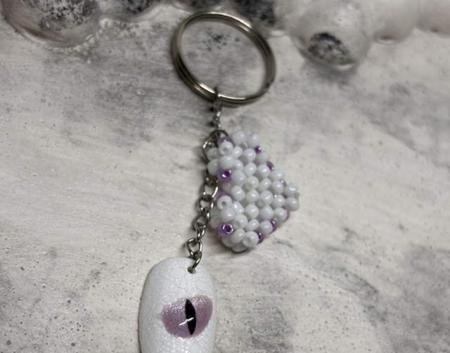 Porte-clé œil dragon blanc