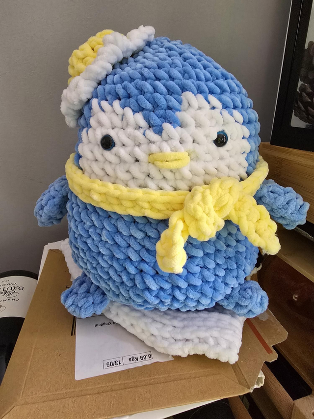 Penguin with scarf and hat