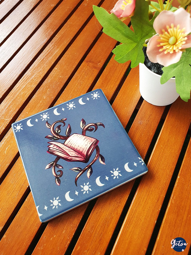 Sous-verre en porcelaine livre magique