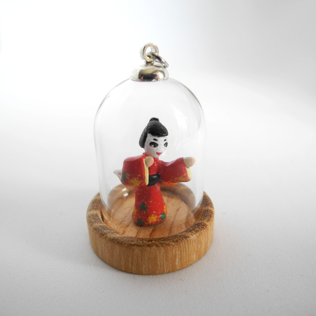 Kitsune disguised as Geisha in a Kimono adorned with autumn leaves - miniature pendant for Japan enthusiasts