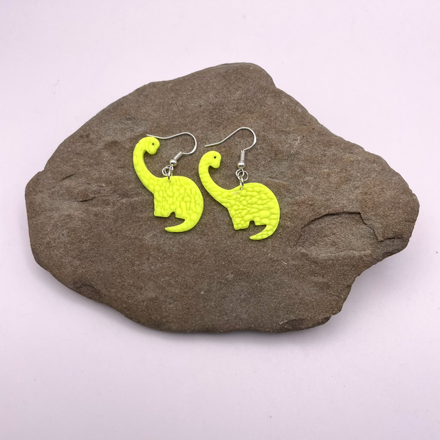 Yellow brachiosaurus earrings