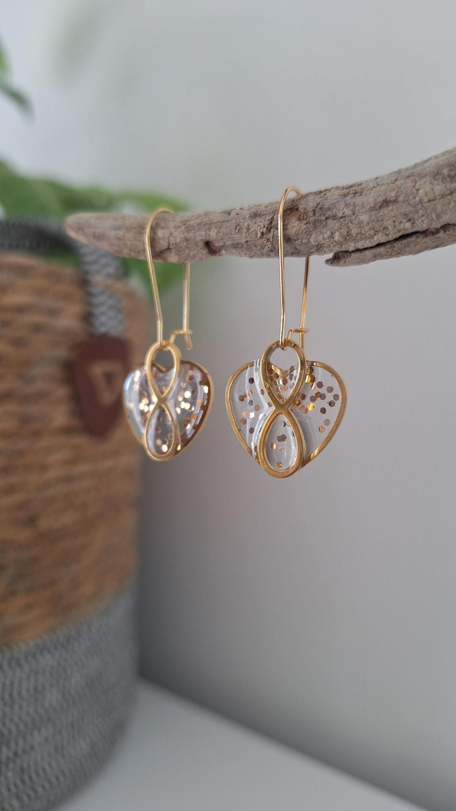 Boucles oreilles cœurs infinis dorées et paillettes