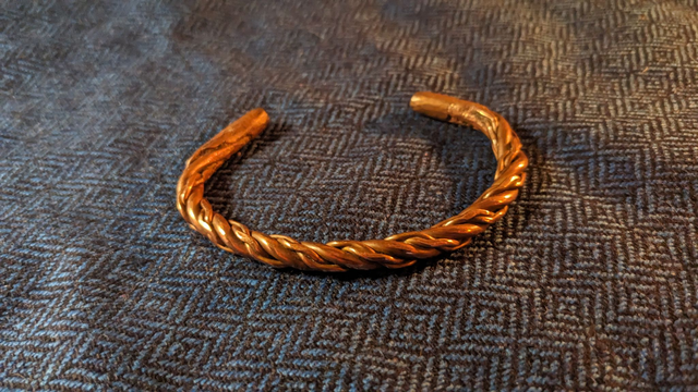 Complex twisted bronze arm ring
