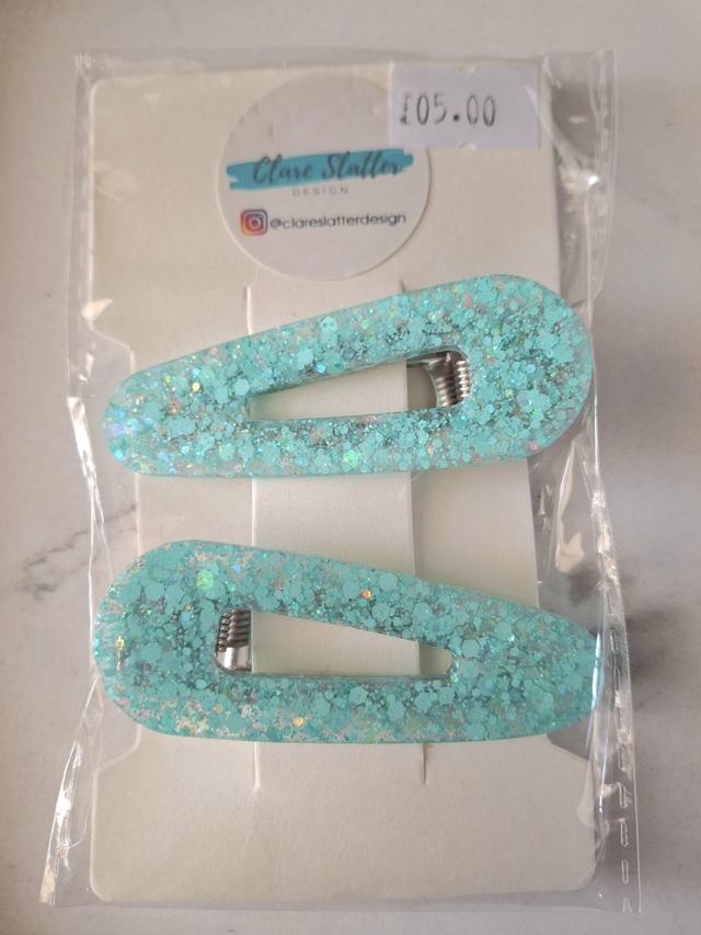 Mint green pear shape glitter clip paid