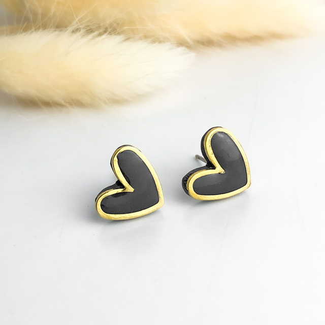Black and brass heart stud earrings