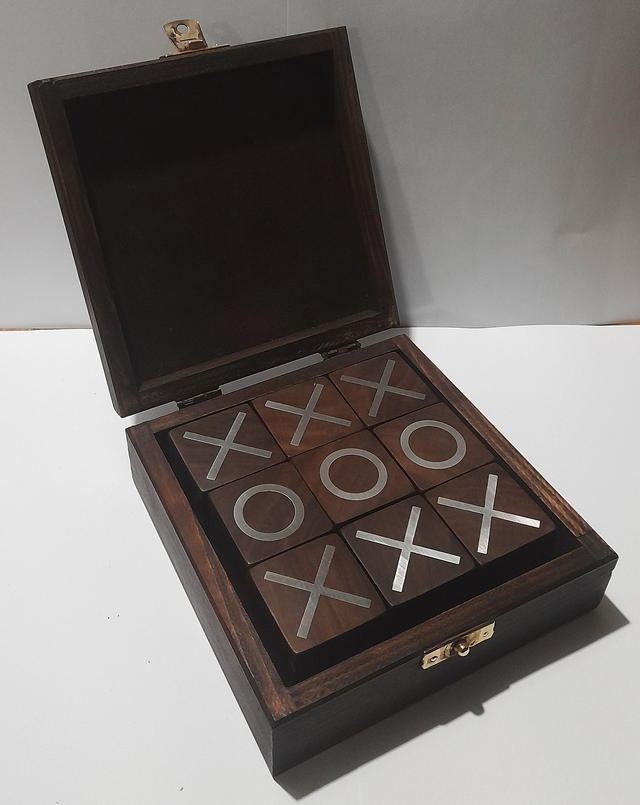 Hand made walnut noughts and crosses blocks in a box