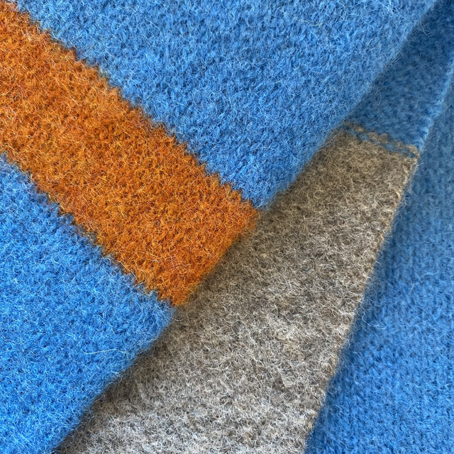 Wind knitted scarf blue, rust, grey melange
