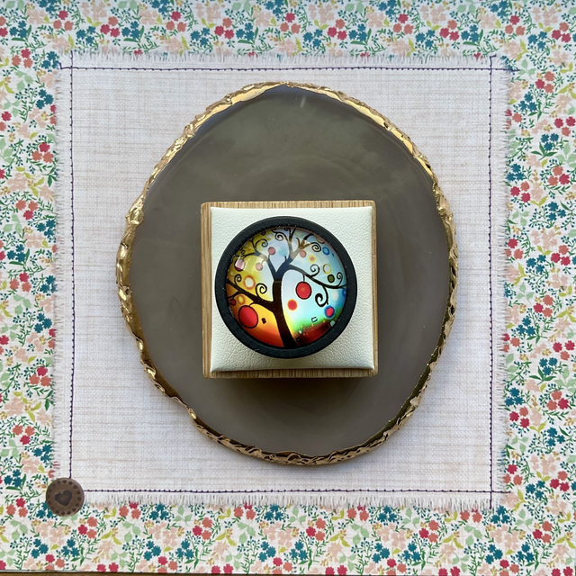 Handmade glass brooch with printed design. Clothes accessories.  