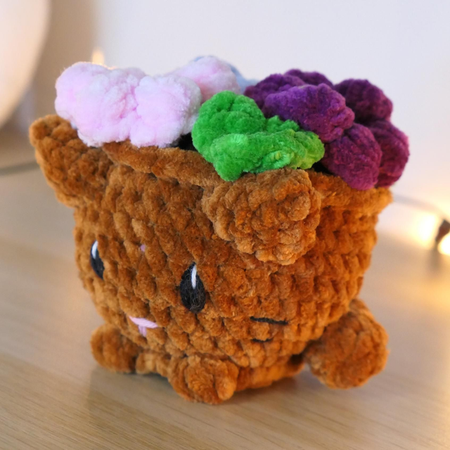 Le chat-pot de fleur