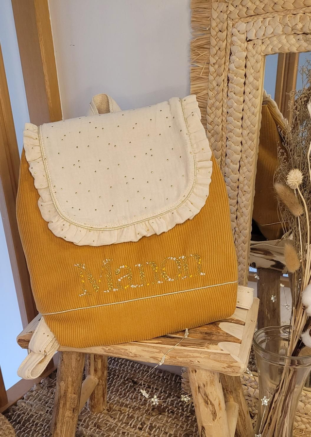 Sac à dos moutarde et blanc cassé 