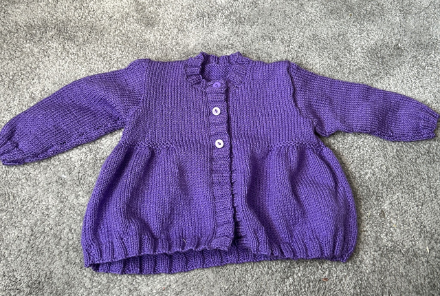 G14. Girls cardigan 26 inch chest