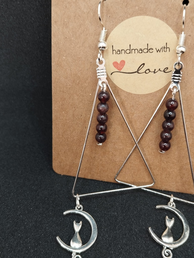 Boucle d'oreille oeil de taureau avec chat