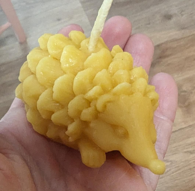 Hedgehog pinecone beeswax candle 