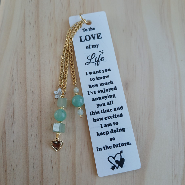 Boekenlegger van kunststof met Aventurijn en leuke bedel (4.027)